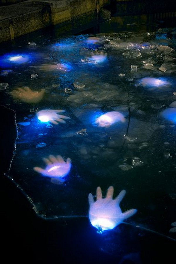 DIY Water Hands Using Glow Sticks And Latex Gloves.