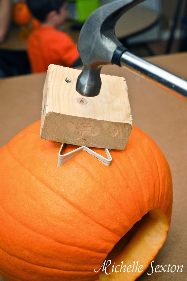 Carving a Pumpkin Using a Cookie Cutter.