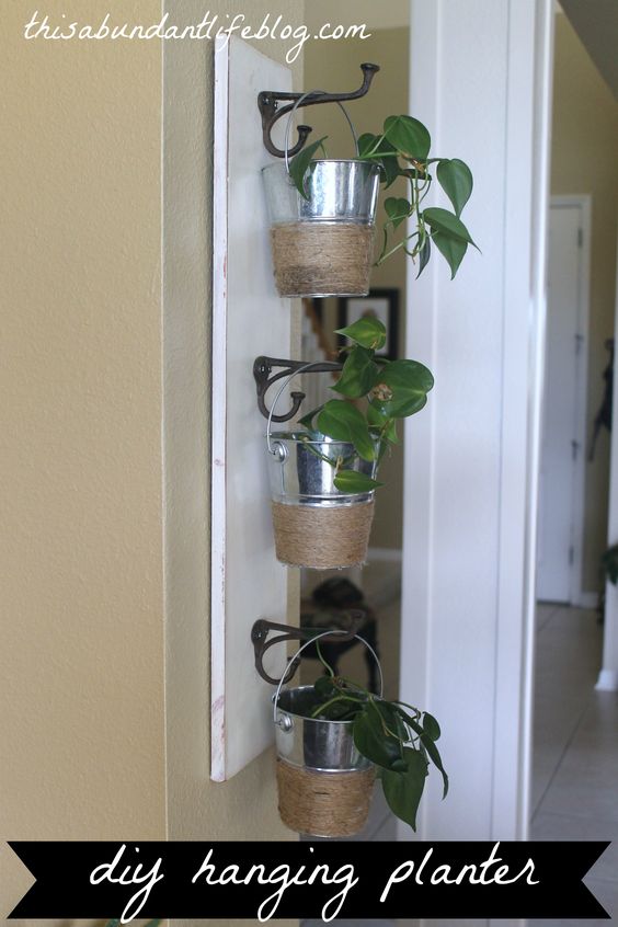 DIY Hanging Planter Using Dollar Store Buckets.