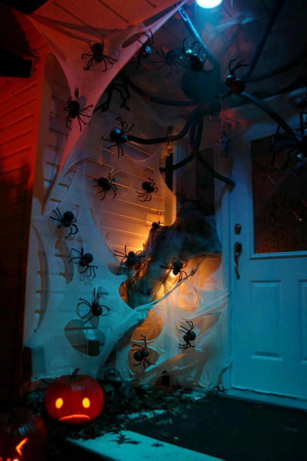 Spooky Front Porch Decor with Discount Store Spider Webs and Spiders.