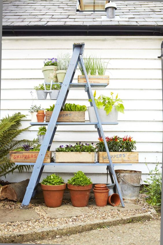 DIY Space Saving Planter Stand From A Wooden Ladder. 