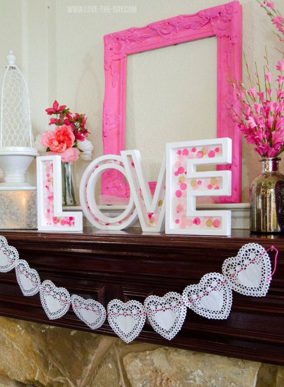 Confetti Love Letters And Doily Garland Decorated Mantel.