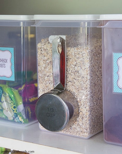 Measuring Cup Hanger On The Outside Of Your Container.