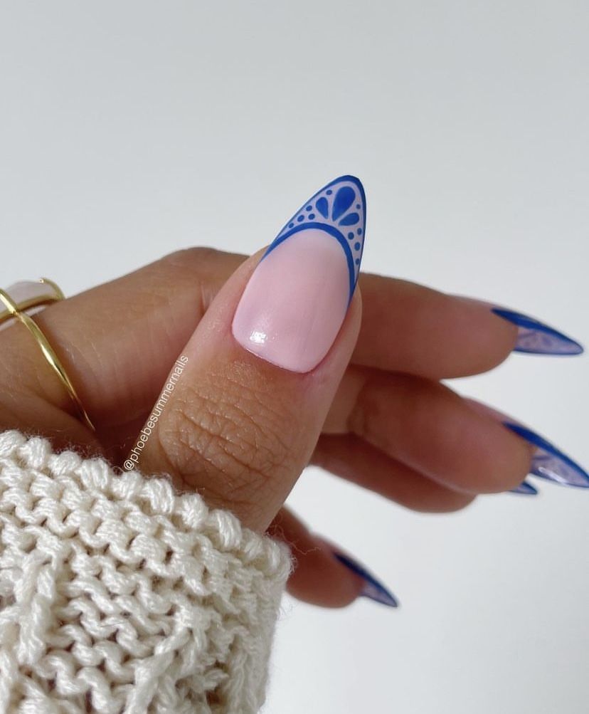 Almond Nails with Blue Flowers Tips.